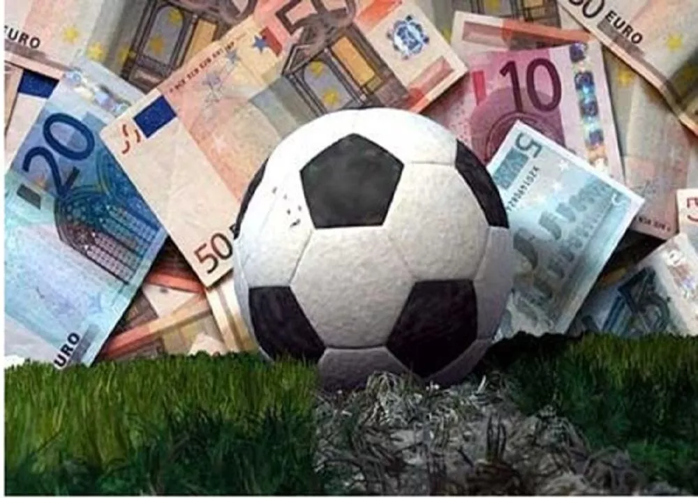 scommesse sportivo il logo del pallone e delle banconote euro